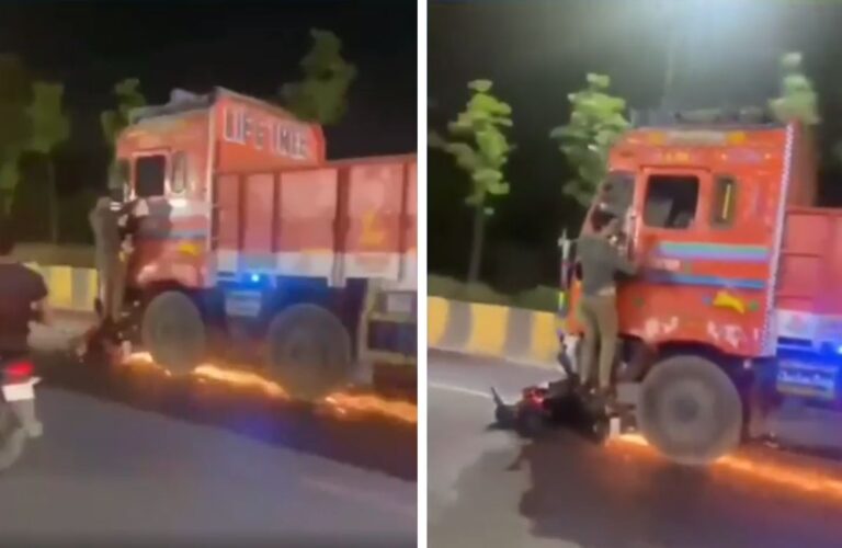 lorry driver drags bike 1