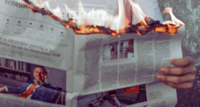 newspaper on fire.jpg.optimal